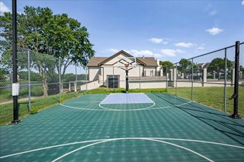 Community basketball court near the pool